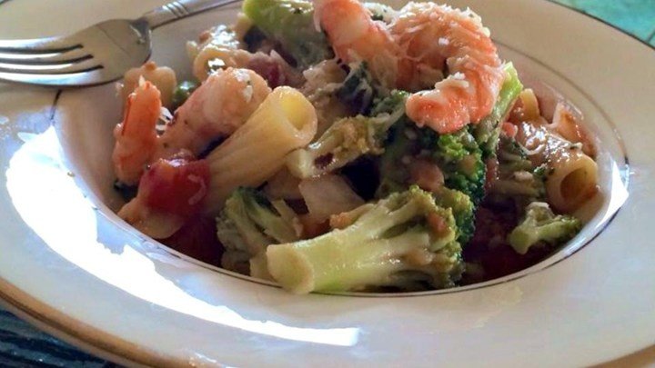 Shrimp, Broccoli Rabe, and Tomatoes Over Penne Pasta download